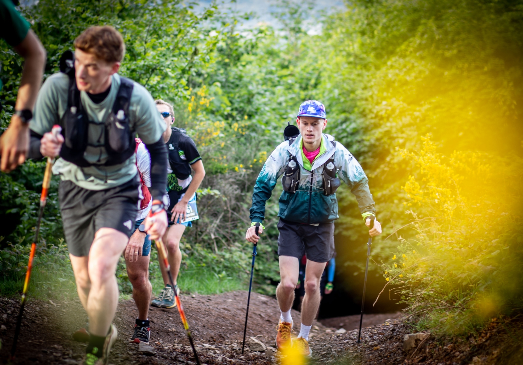 Coureur en plein effort dans la forêt de Champagney lors du Trail des Mines